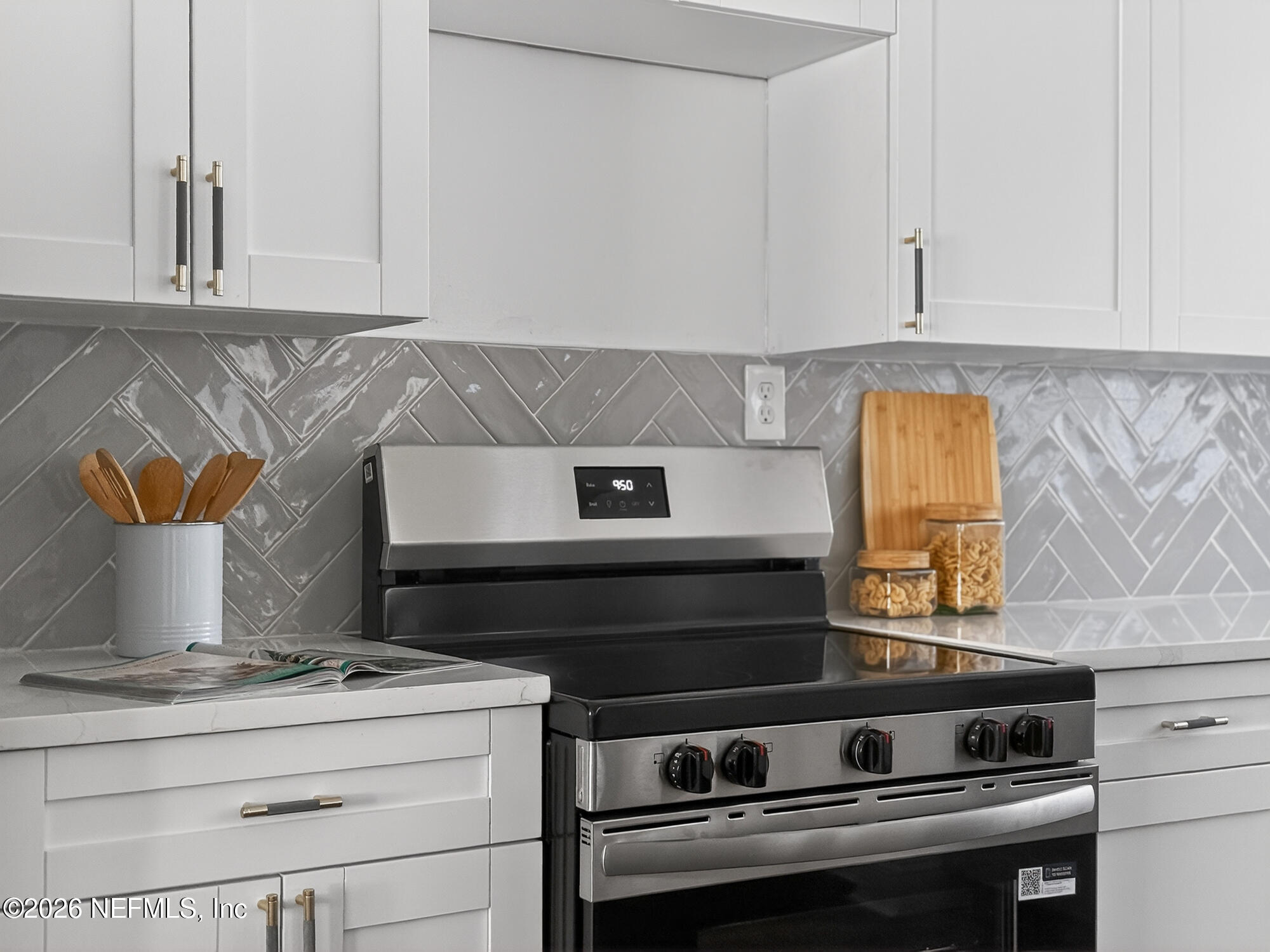 113 Menendez Road St. Augustine, FL 32080 - Photo 24 of 71 a stove top oven sitting inside of a kitchen