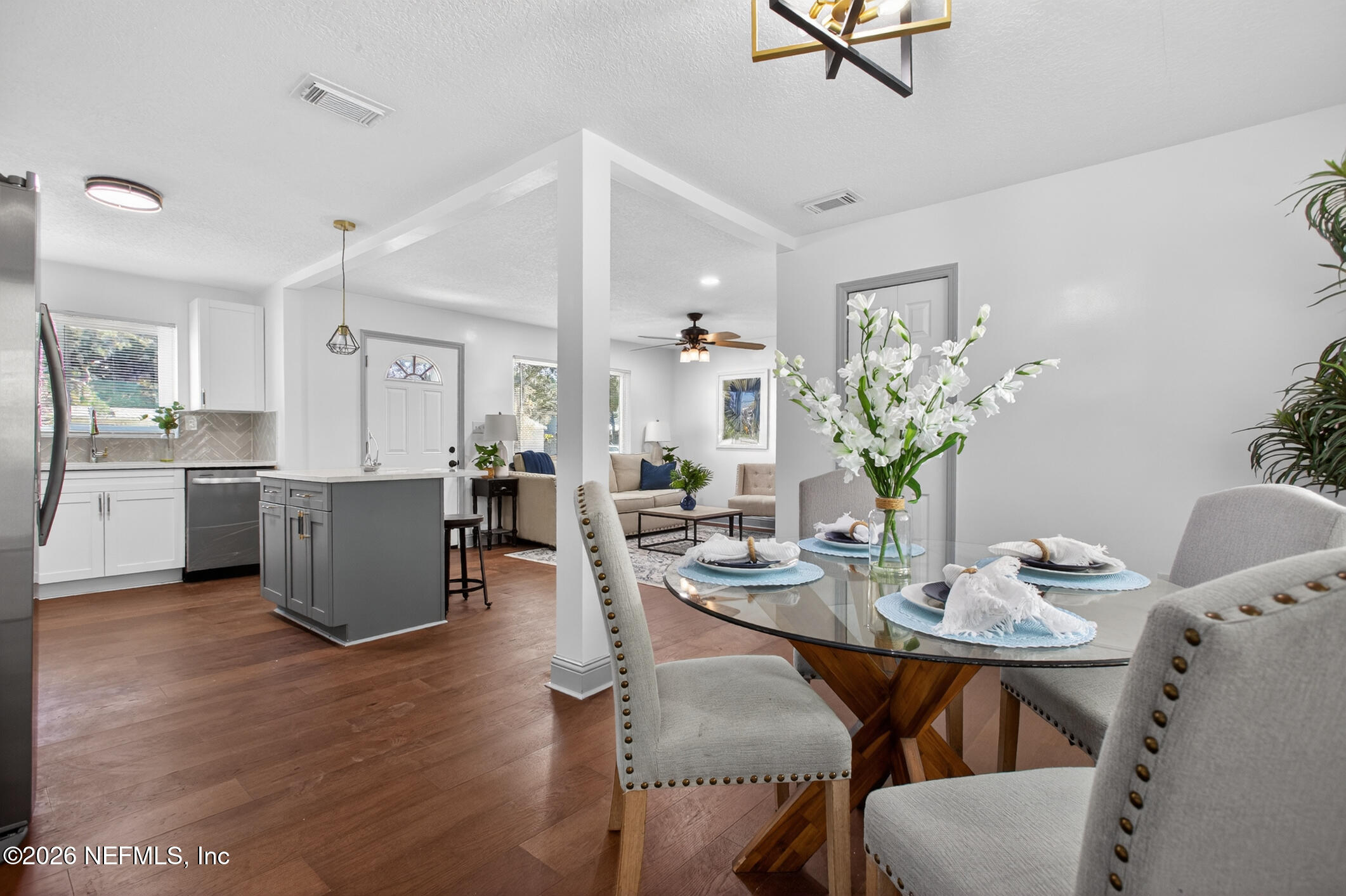 113 Menendez Road St. Augustine, FL 32080 - Photo 28 of 71 a view of a dining room with furniture and wooden floor