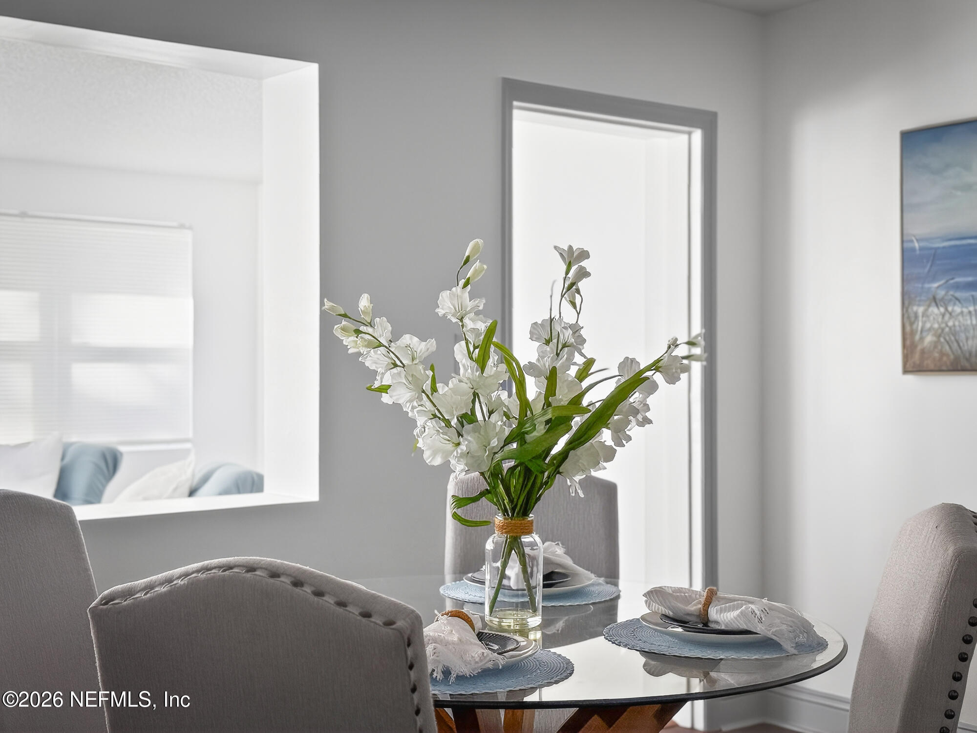 113 Menendez Road St. Augustine, FL 32080 - Photo 30 of 71 a vase of flowers sitting on a table