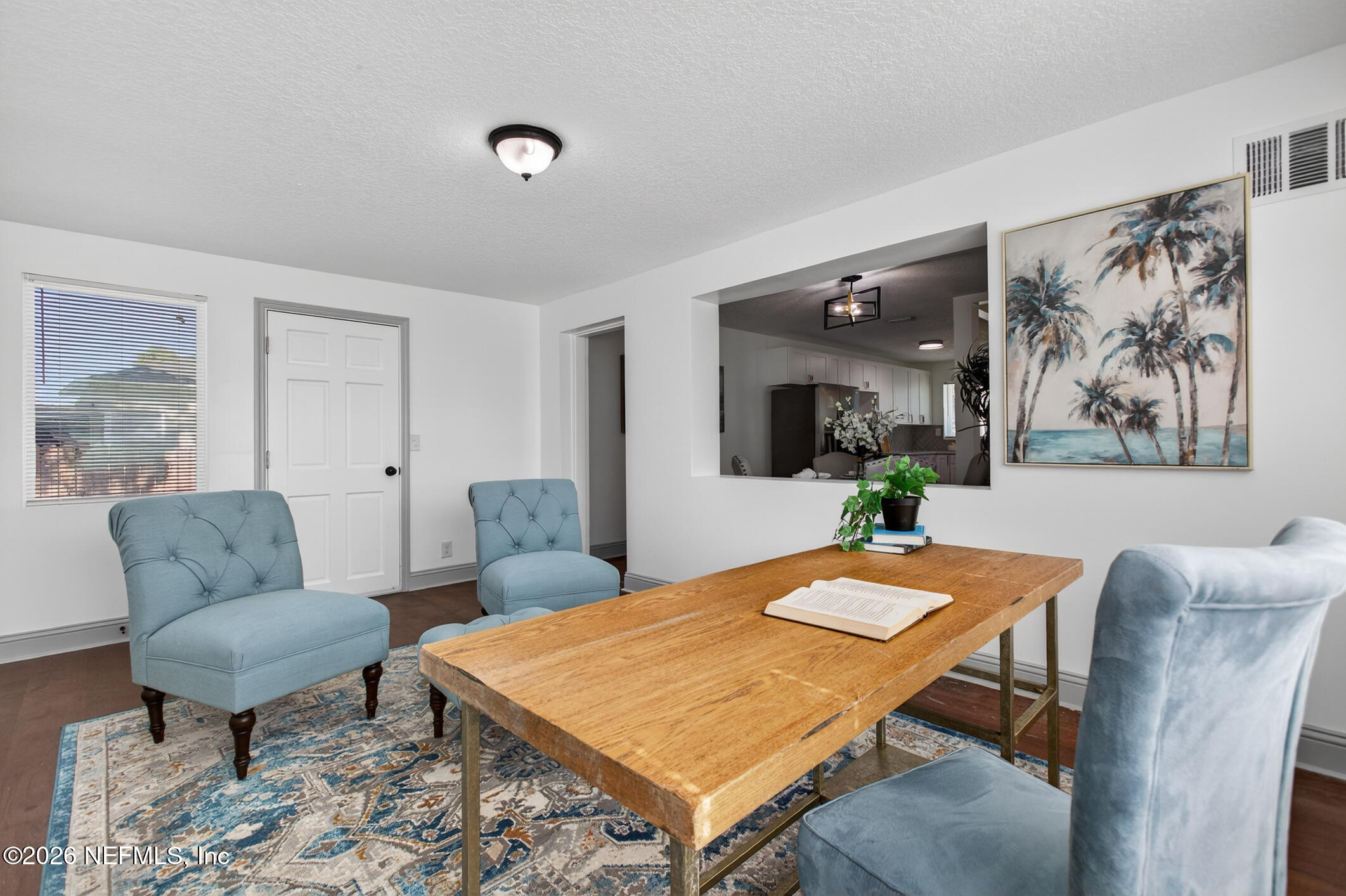 113 Menendez Road St. Augustine, FL 32080 - Photo 34 of 71 a dining room with furniture and wooden floor