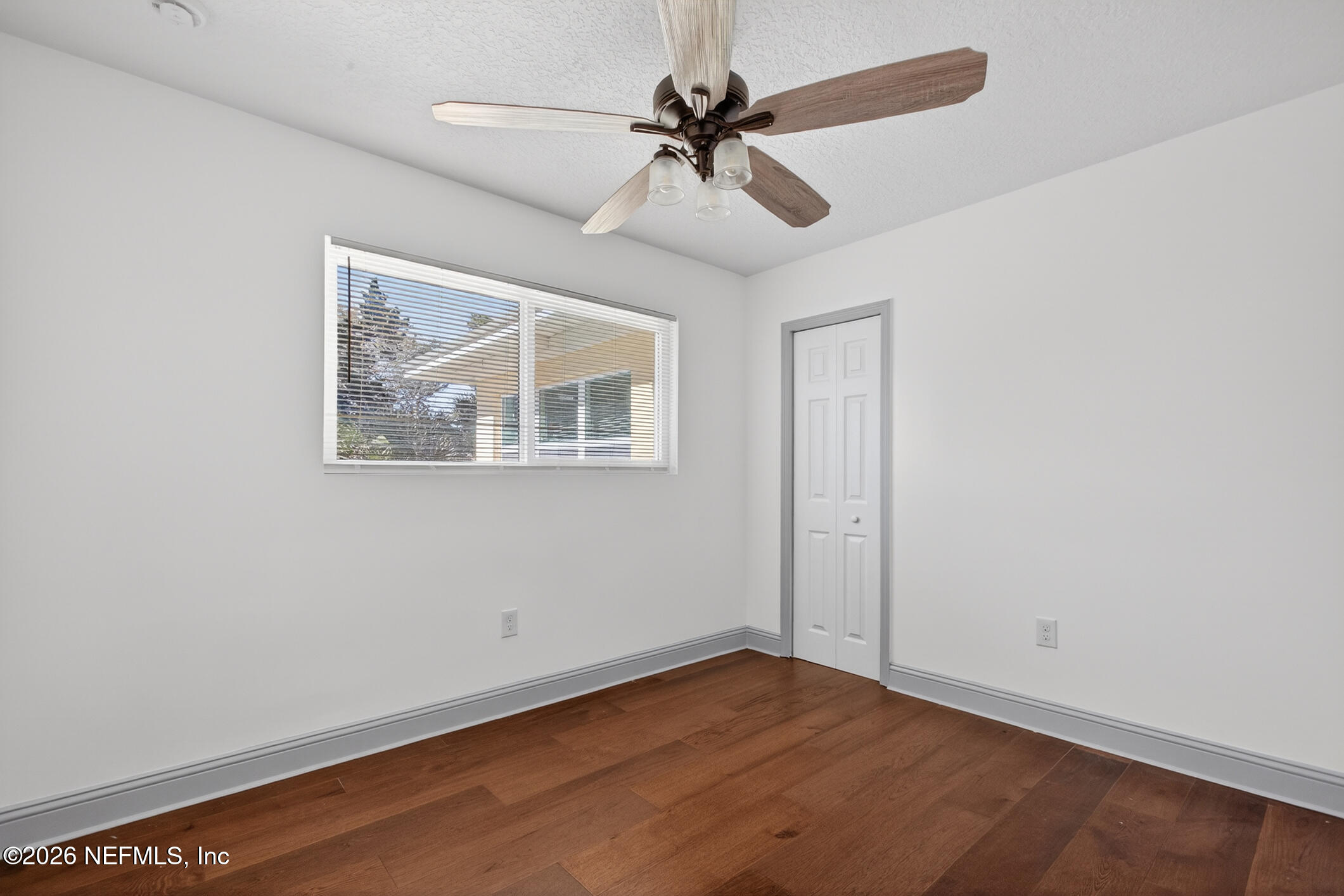 113 Menendez Road St. Augustine, FL 32080 - Photo 36 of 71 a view of an empty room with a window