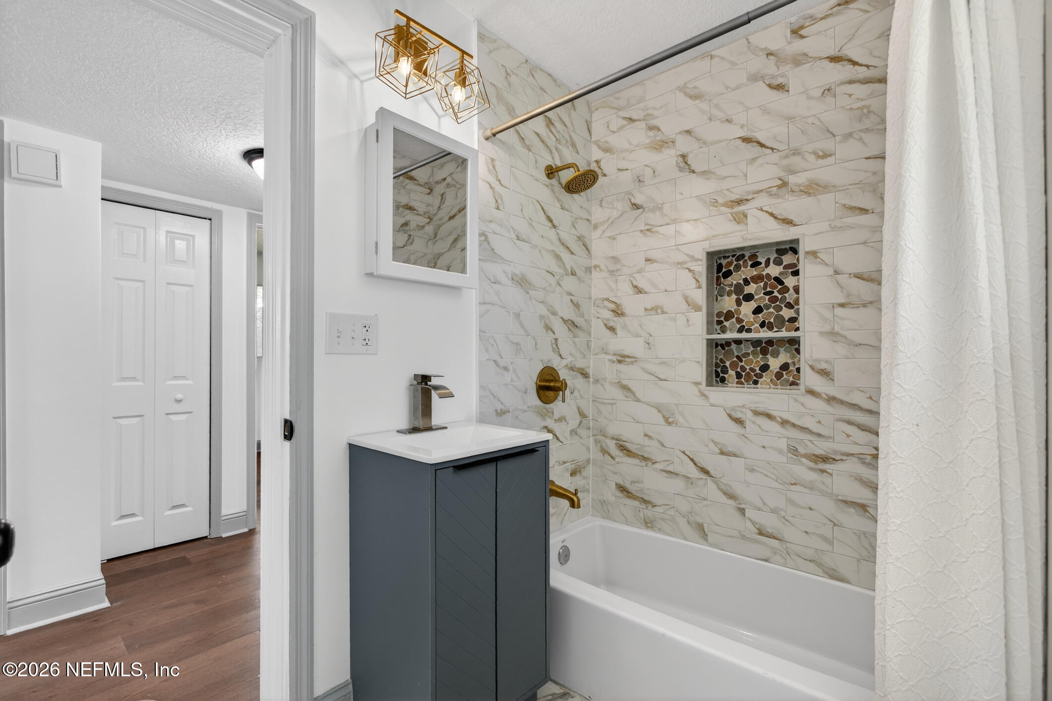 113 Menendez Road St. Augustine, FL 32080 - Photo 45 of 71 a bathroom with a bathtub and a shower