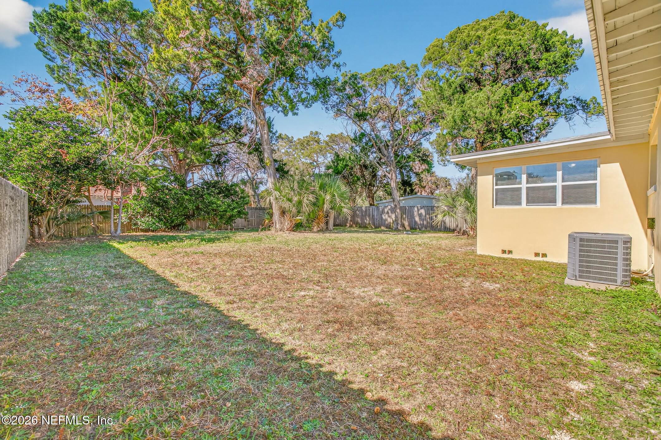 113 Menendez Road St. Augustine, FL 32080 - Photo 59 of 71 a backyard of a house with large trees