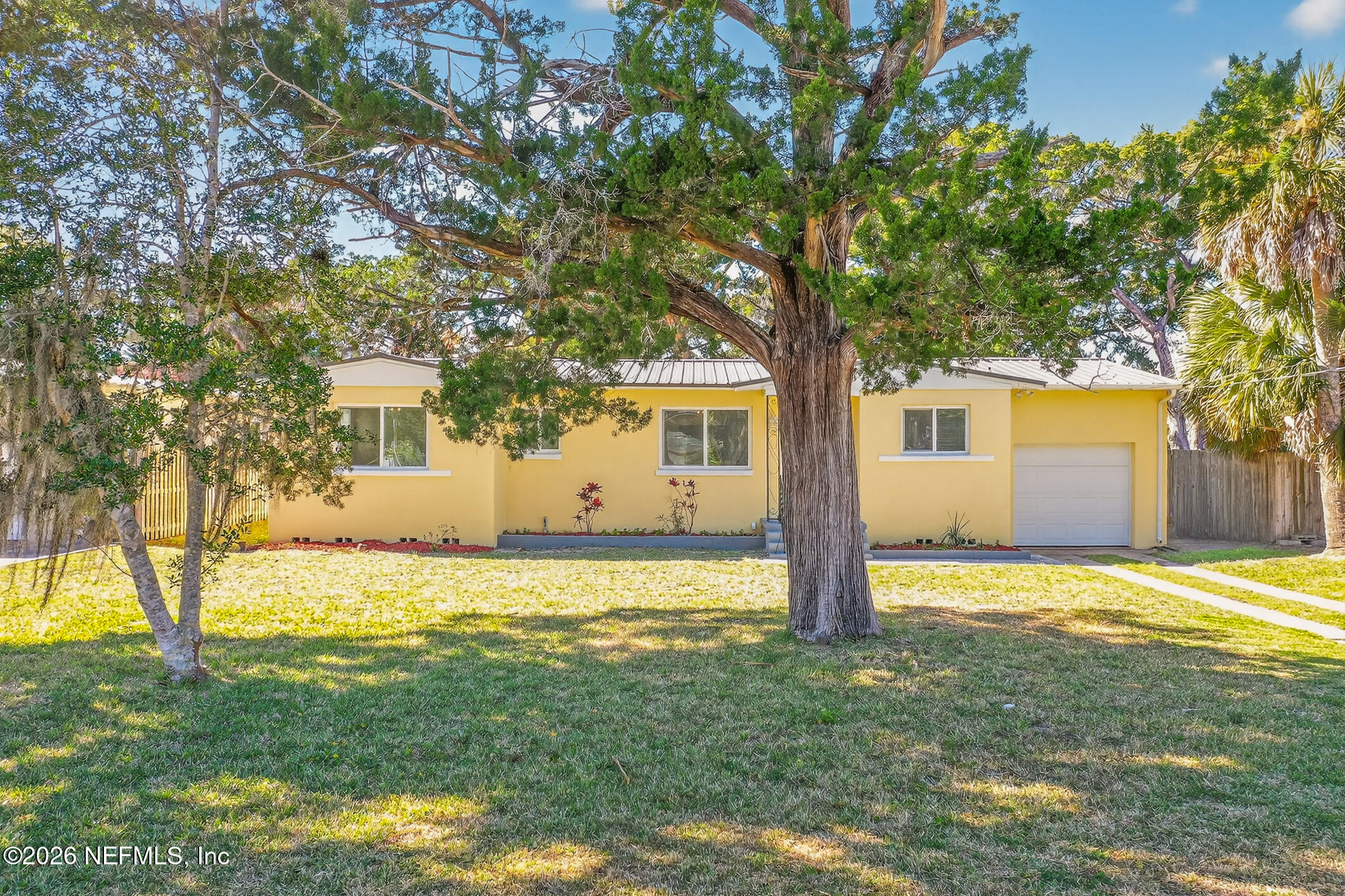 113 Menendez Road St. Augustine, FL 32080 - Photo 60 of 71 a view of a house with backyard and tree