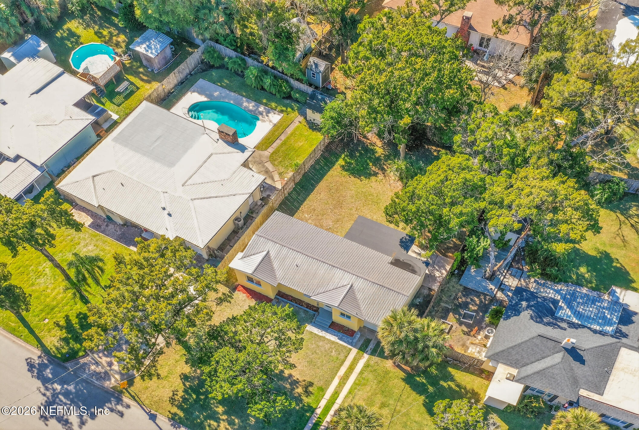 113 Menendez Road St. Augustine, FL 32080 - Photo 63 of 71 an aerial view of a house with a yard and swimming pool