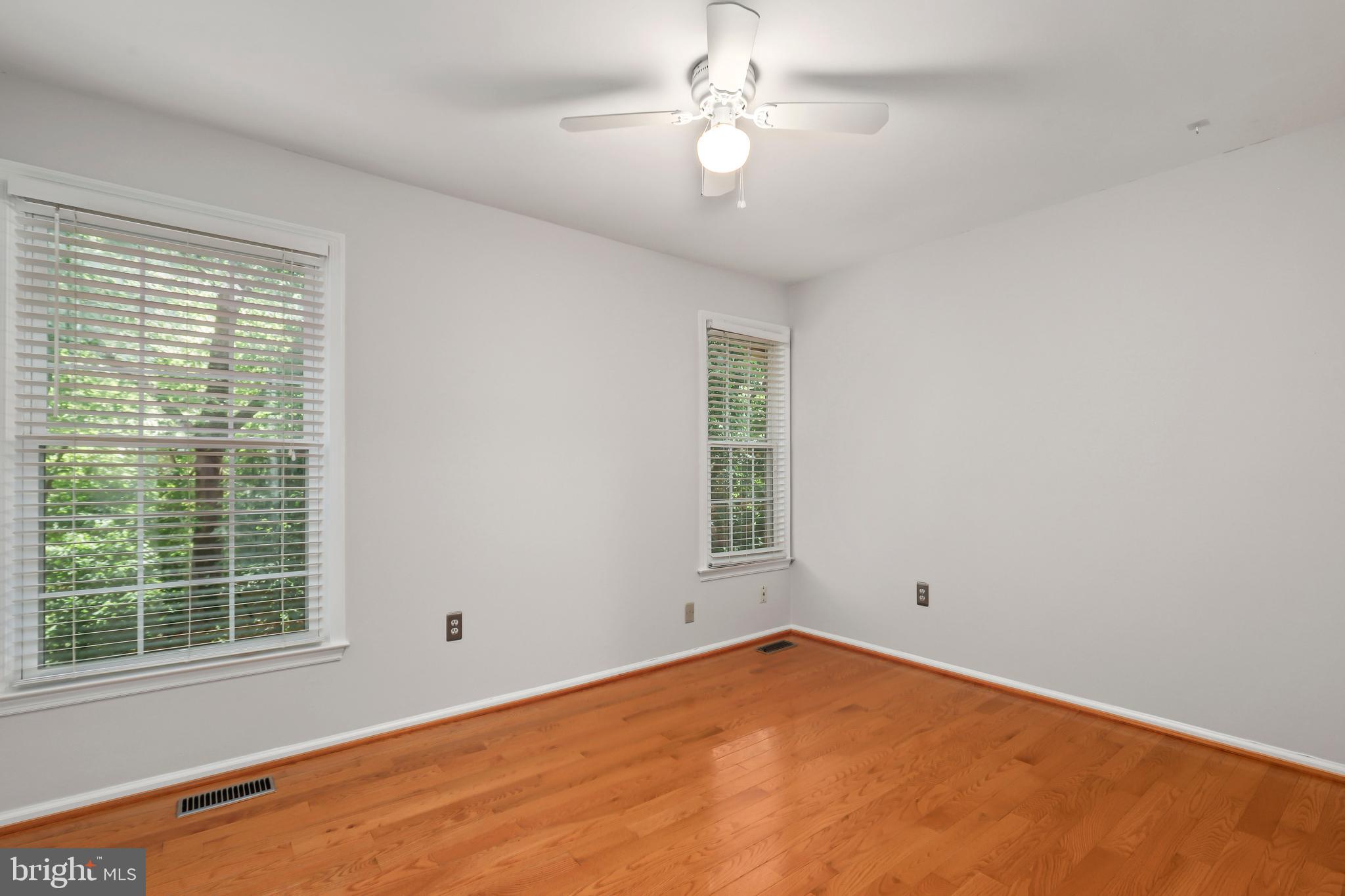 2434 South Walter Reed Drive, Unit 3 Arlington, VA 22206 - Photo 15 of 36 an empty room with a window