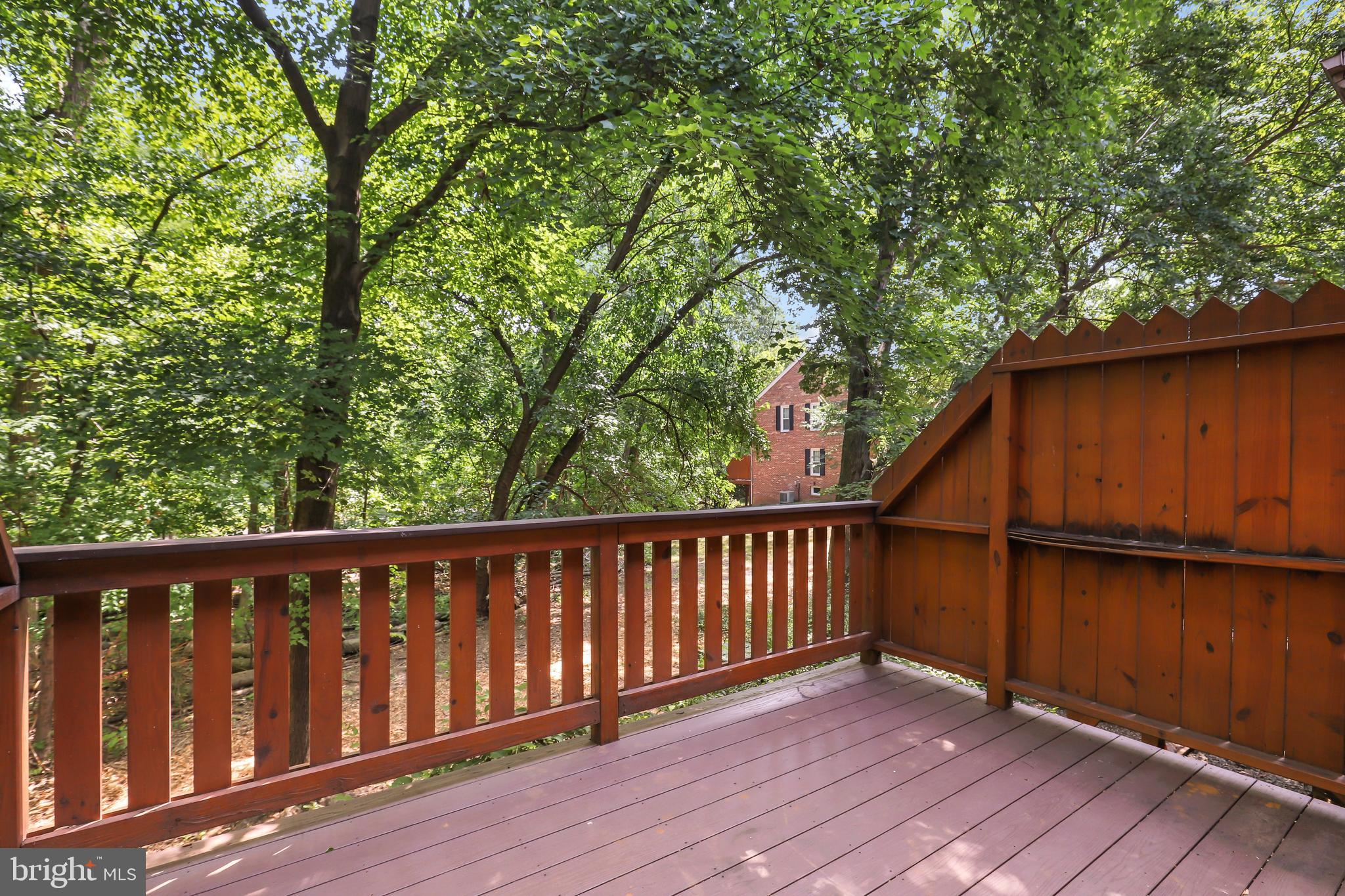 2434 South Walter Reed Drive, Unit 3 Arlington, VA 22206 - Photo 34 of 36 a view of wooden deck