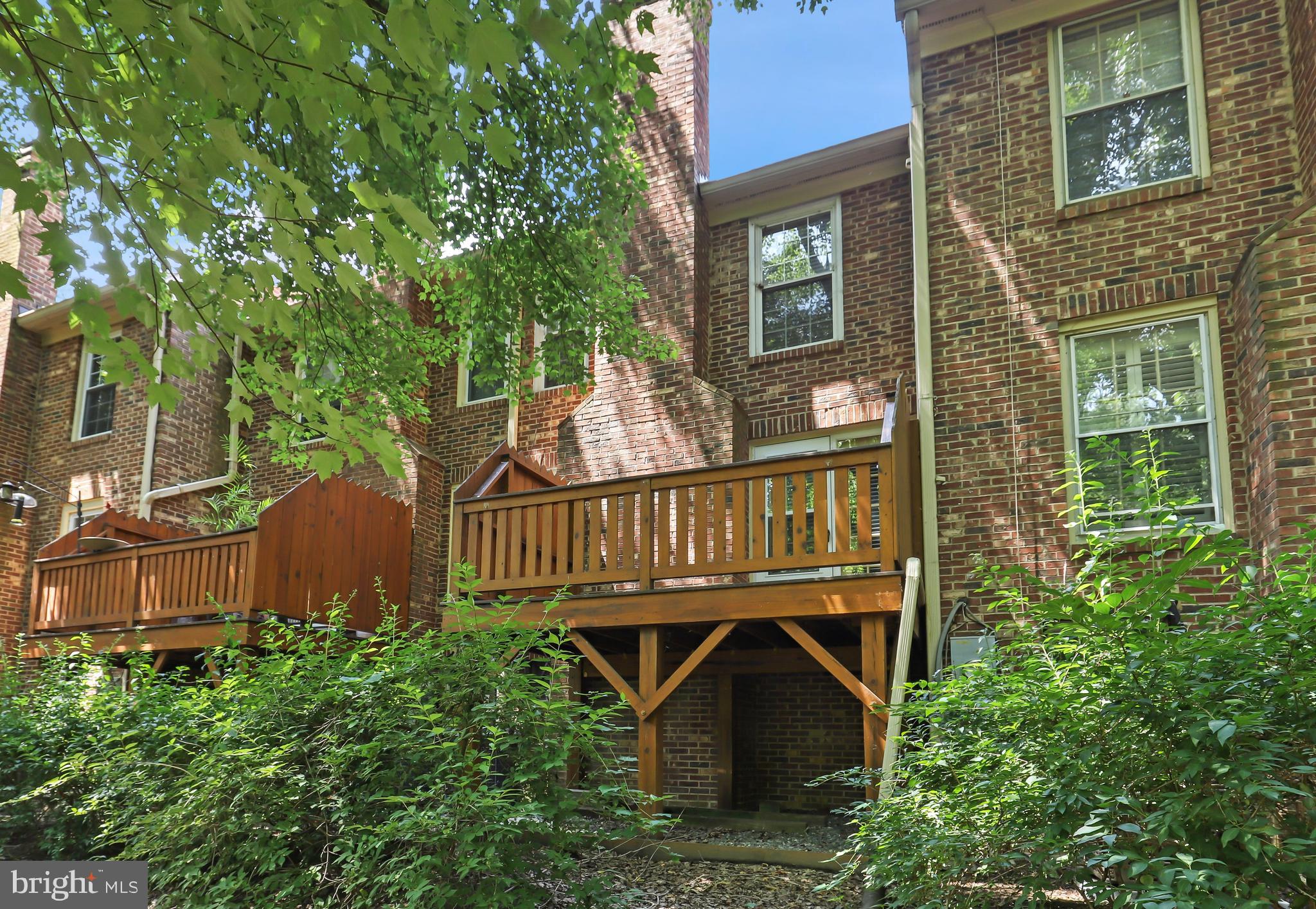2434 South Walter Reed Drive, Unit 3 Arlington, VA 22206 - Photo 35 of 36 a view of a chair and table in the balcony
