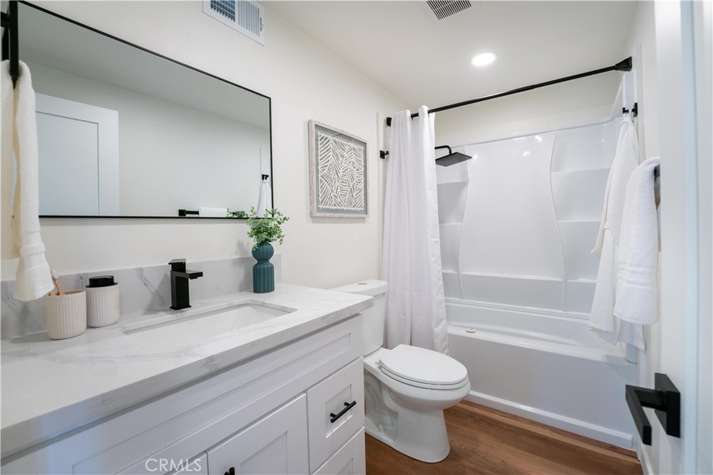 675 Huntington Road Cambria, CA 93428 - Photo 20 of 30 a bathroom with a sink a toilet and shower