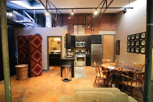 a view of a dining room with furniture