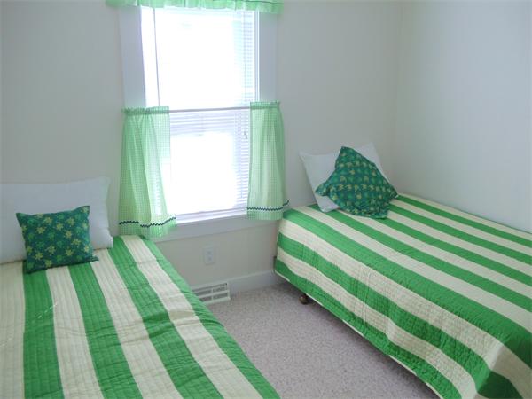 14 Bayview Road Marion, MA 02738 - Photo 12 of 22 a bedroom with a bed and a window