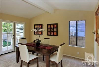 12522 Spring Creek Road Moorpark, CA 93021 - Photo 9 of 20 a view of a dining room with furniture and a window