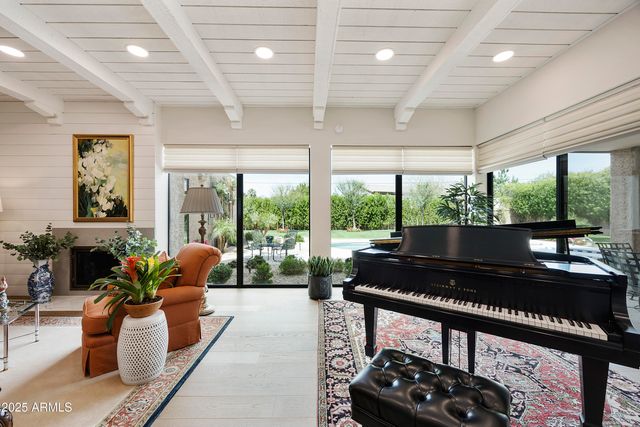 a living room with furniture and a window