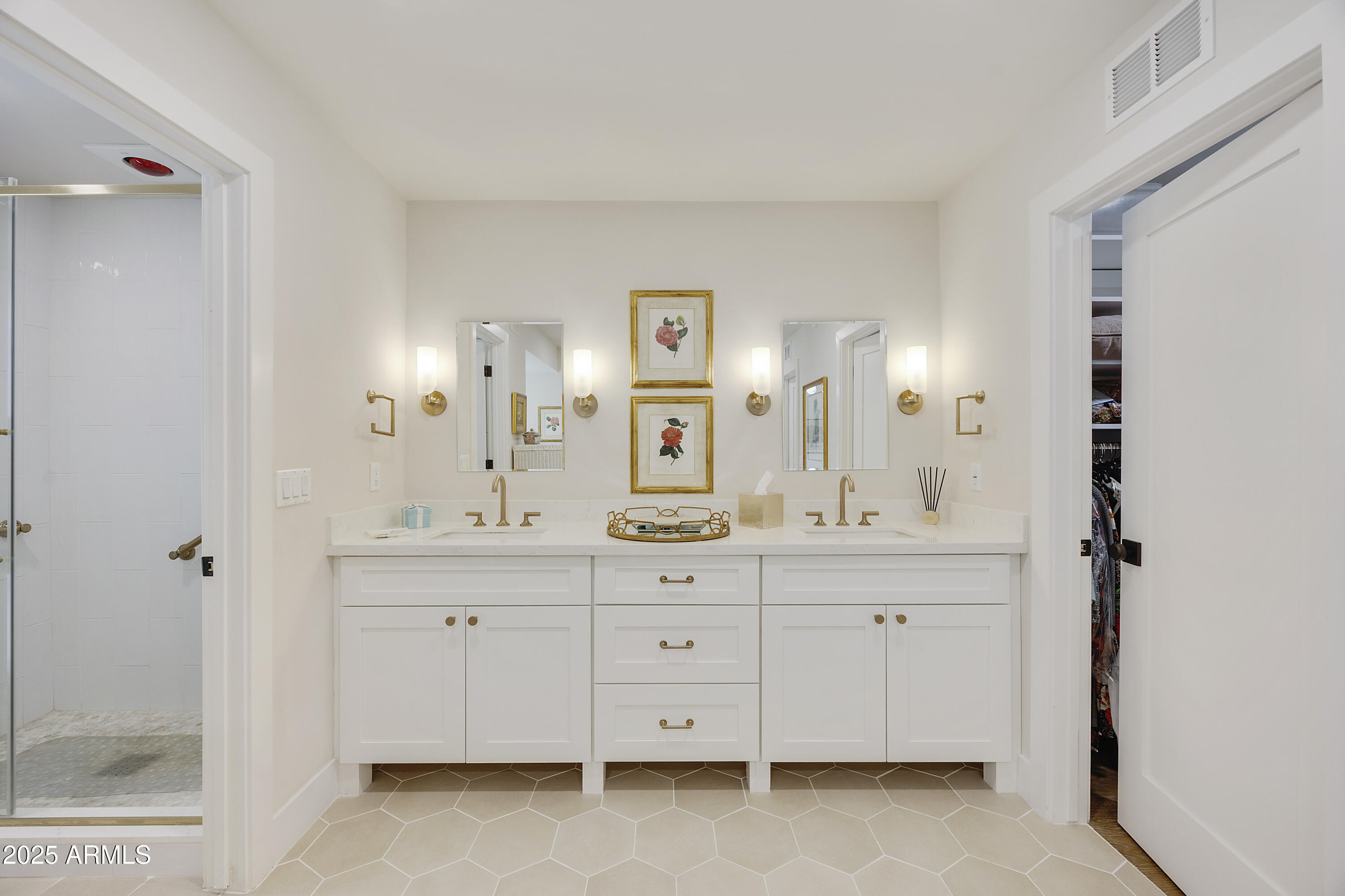 4436 East Camelback Road, Unit 37 Phoenix, AZ 85018 - Photo 37 of 55 a spacious bathroom with a double vanity sink a mirror and a shower