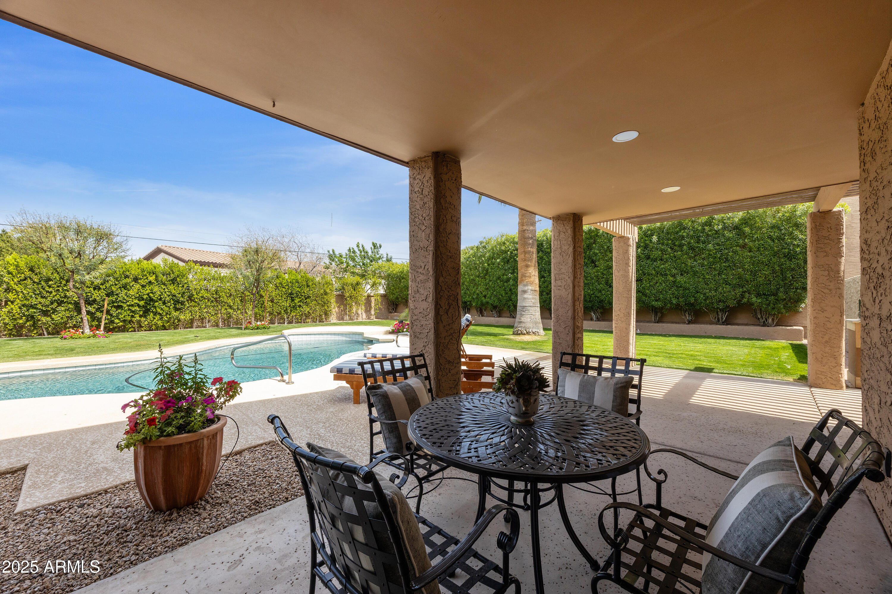 4436 East Camelback Road, Unit 37 Phoenix, AZ 85018 - Photo 45 of 55 Covered patio around pool area