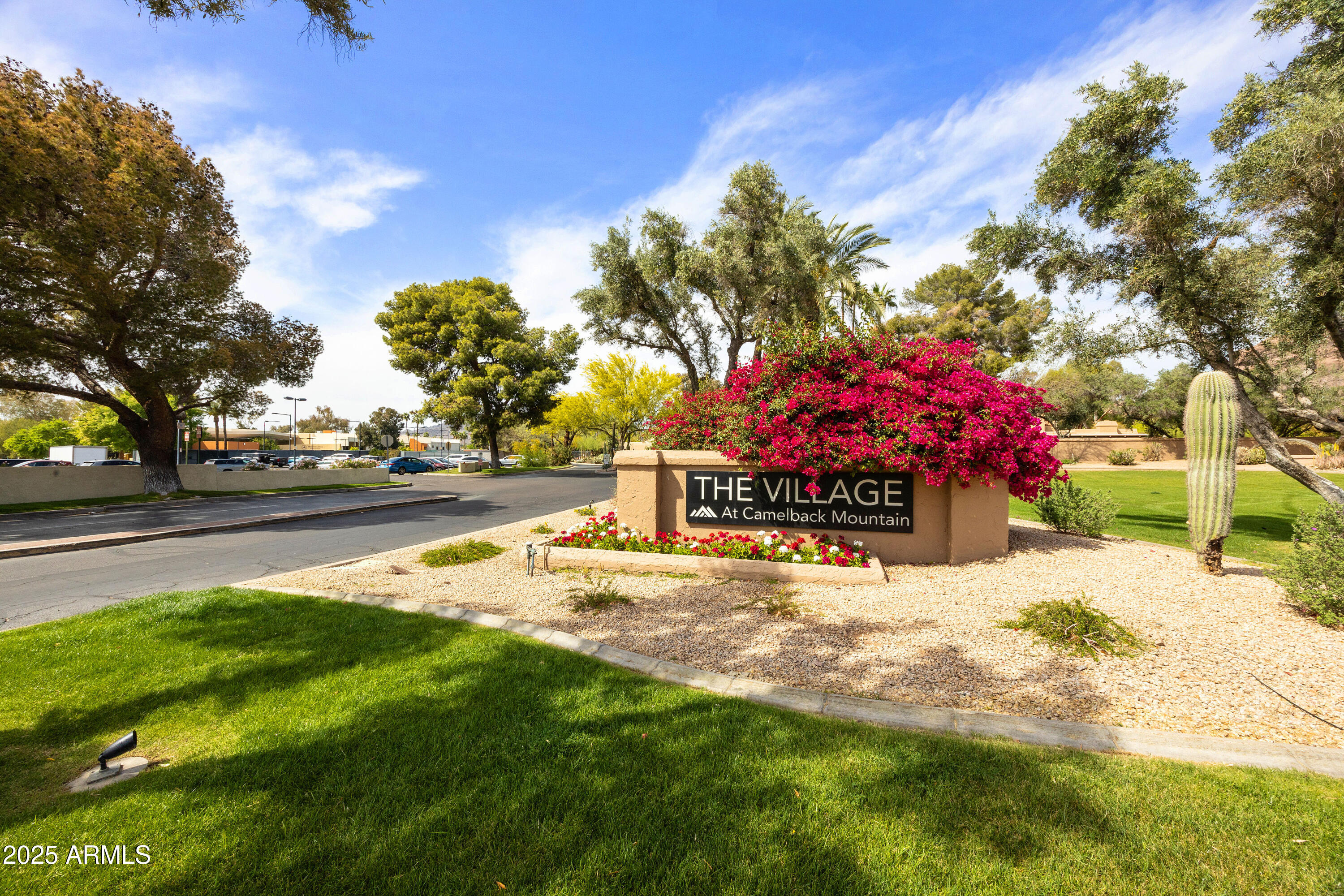 4436 East Camelback Road, Unit 37 Phoenix, AZ 85018 - Photo 55 of 55 a view of backyard with swimming pool and seating space