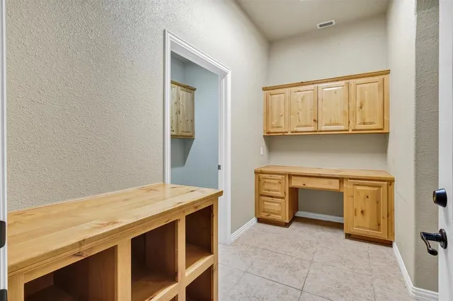 a kitchen with a stove and a sink