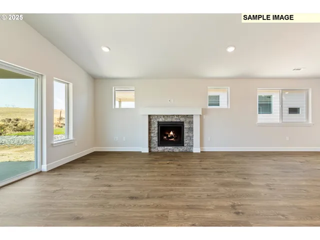a view of a kitchen with a dishwasher and cabinets