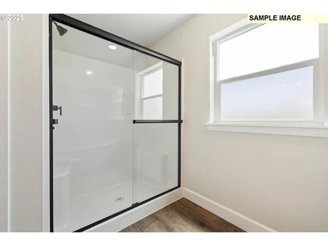 a view of a bathtub in a bathroom