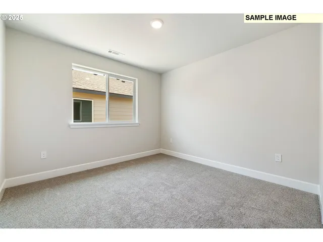 a bathroom with a sink vanity and a toilet