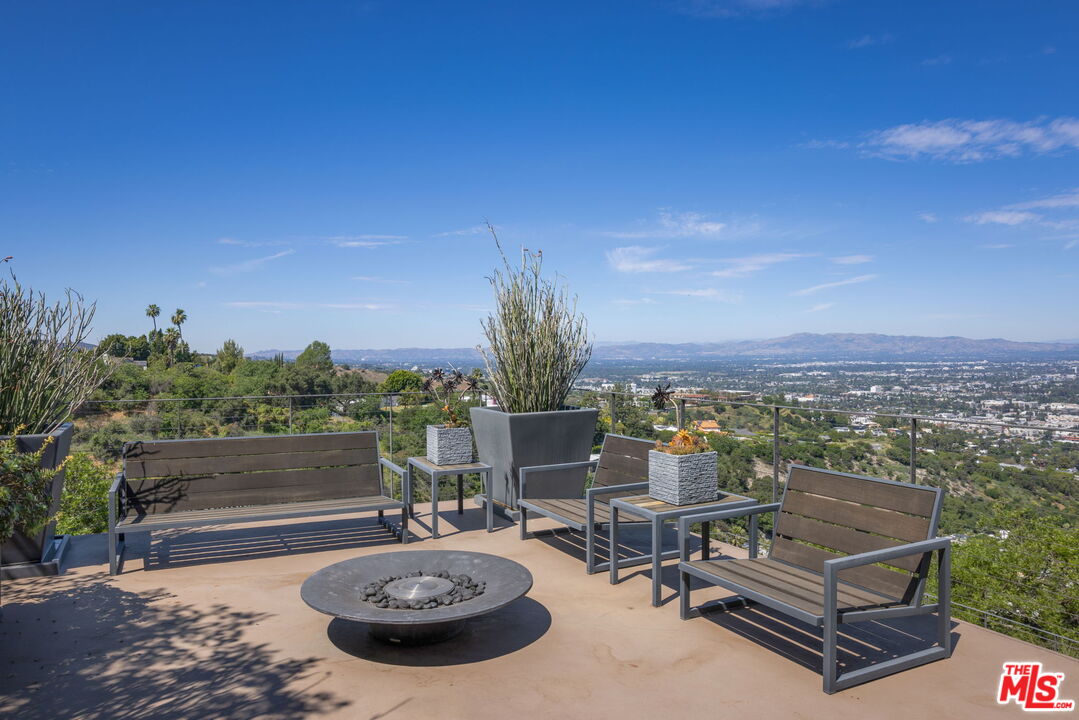3337 Beverly Ranch Road Beverly Hills, CA 90210 - Photo 23 of 36 a view of a terrace with furniture