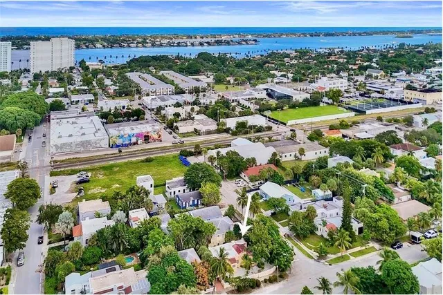 an aerial view of residential houses with outdoor space