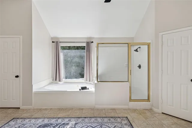 a view of a small space with wooden floor and a cabinet