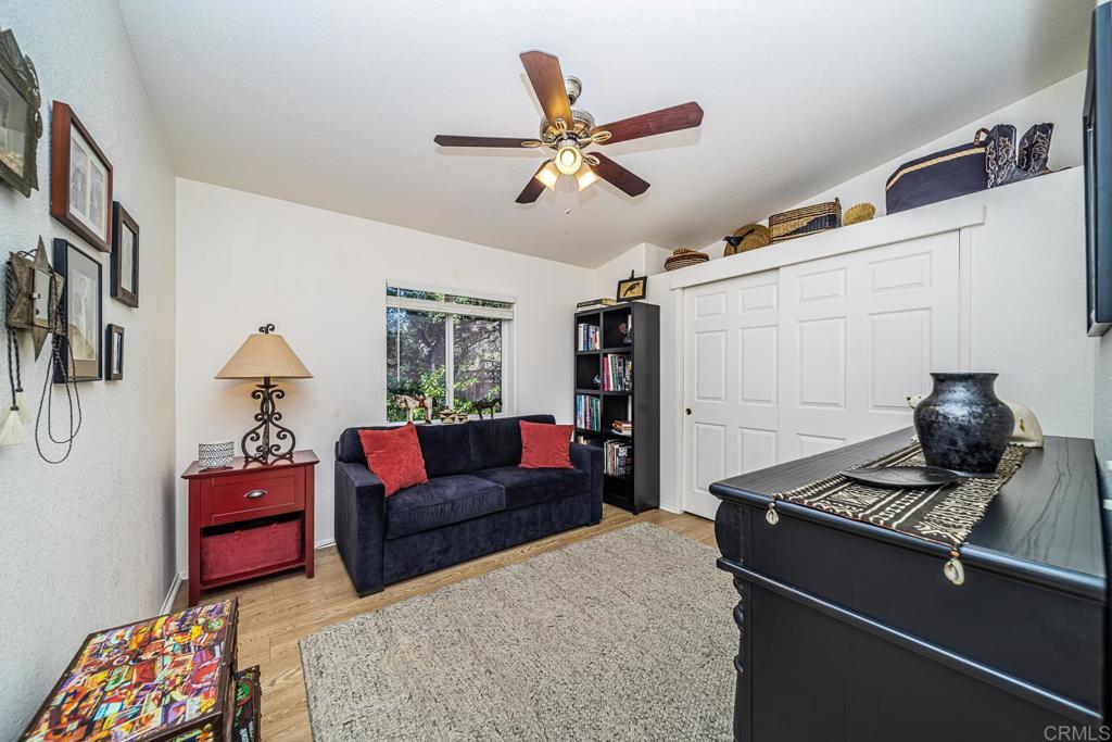 4747 Oak Crest Road, Unit 8 Fallbrook, CA 92028 - Photo 16 of 36 a living room with furniture and a window