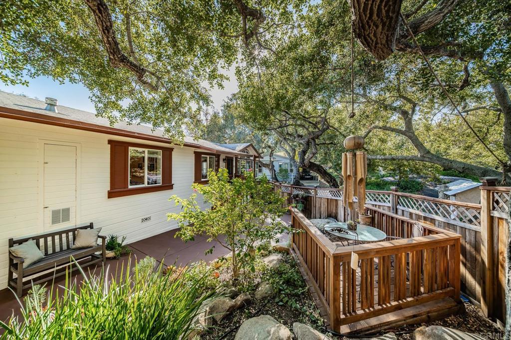 4747 Oak Crest Road, Unit 8 Fallbrook, CA 92028 - Photo 23 of 36 a view of house with backyard and trees