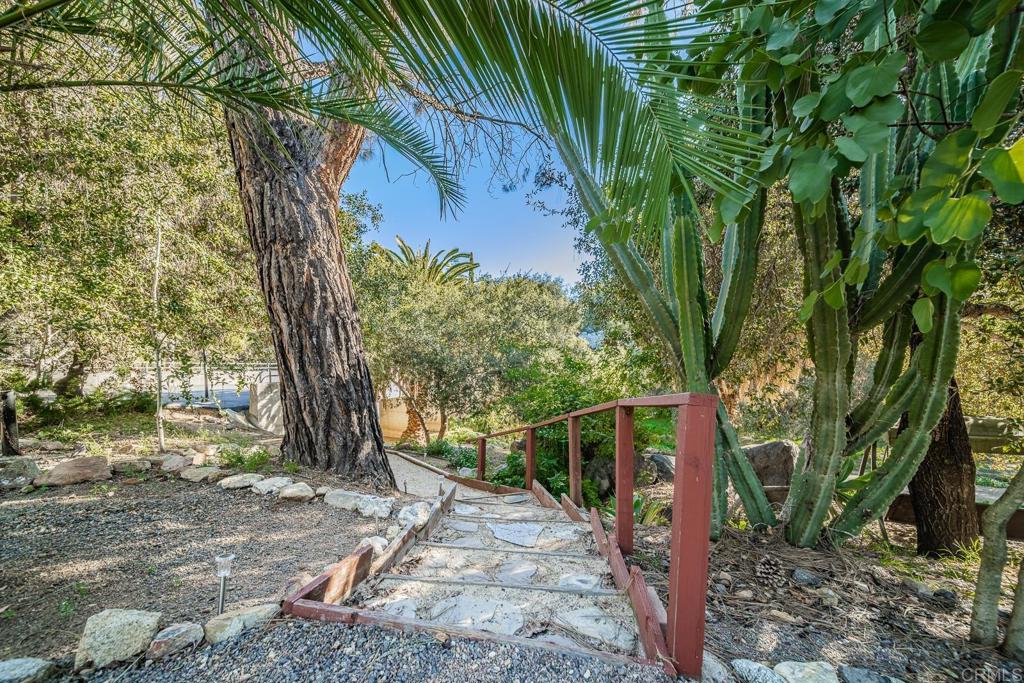 4747 Oak Crest Road, Unit 8 Fallbrook, CA 92028 - Photo 28 of 36 a view of a tree in front of a house