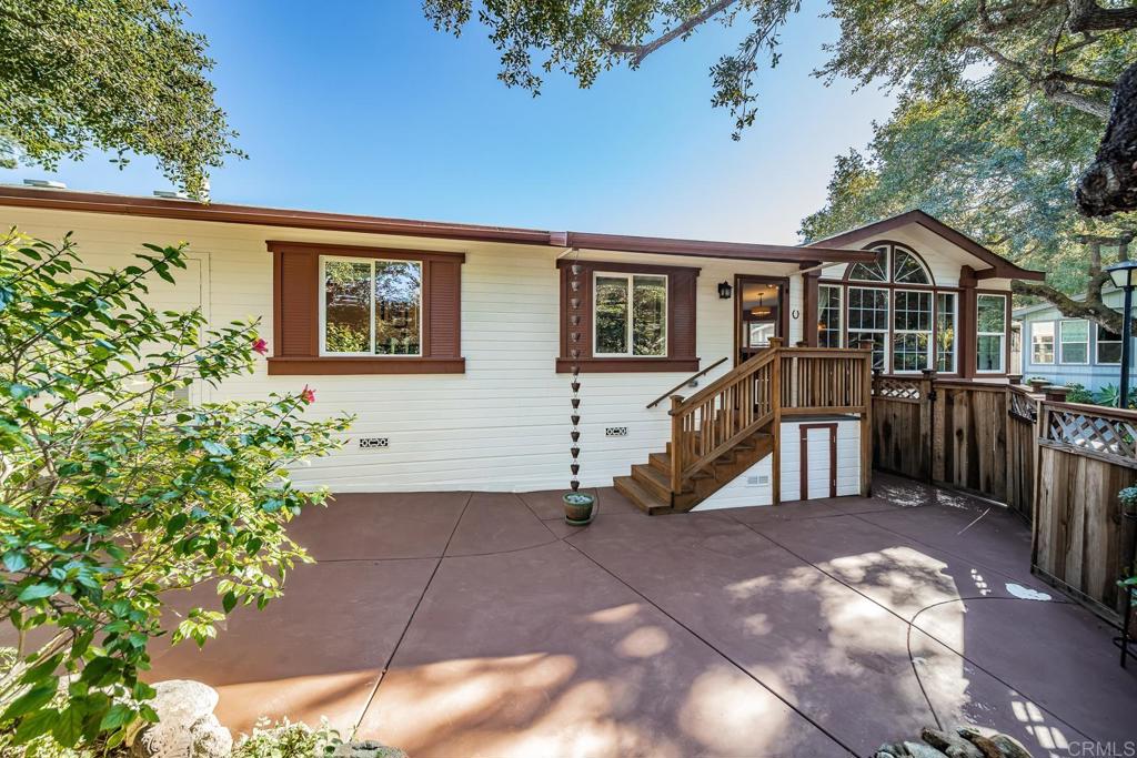 4747 Oak Crest Road, Unit 8 Fallbrook, CA 92028 - Photo 3 of 36 a view of a house with a yard