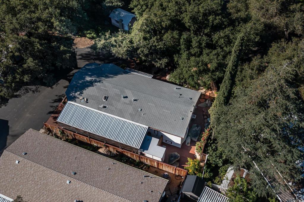 4747 Oak Crest Road, Unit 8 Fallbrook, CA 92028 - Photo 34 of 36 an aerial view of residential house with outdoor space and trees all around
