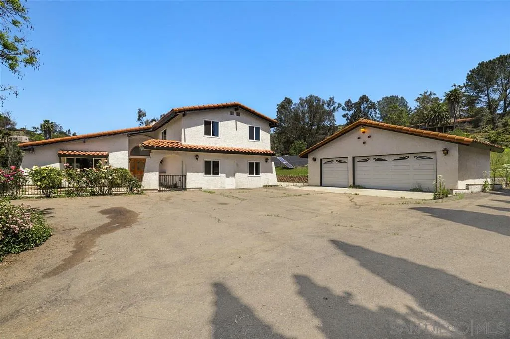 15157 Crocker Road Poway, CA 92064 - Photo 15 of 22 front view of a house with a street