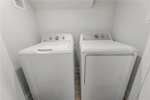 a utility room with dryer and washer