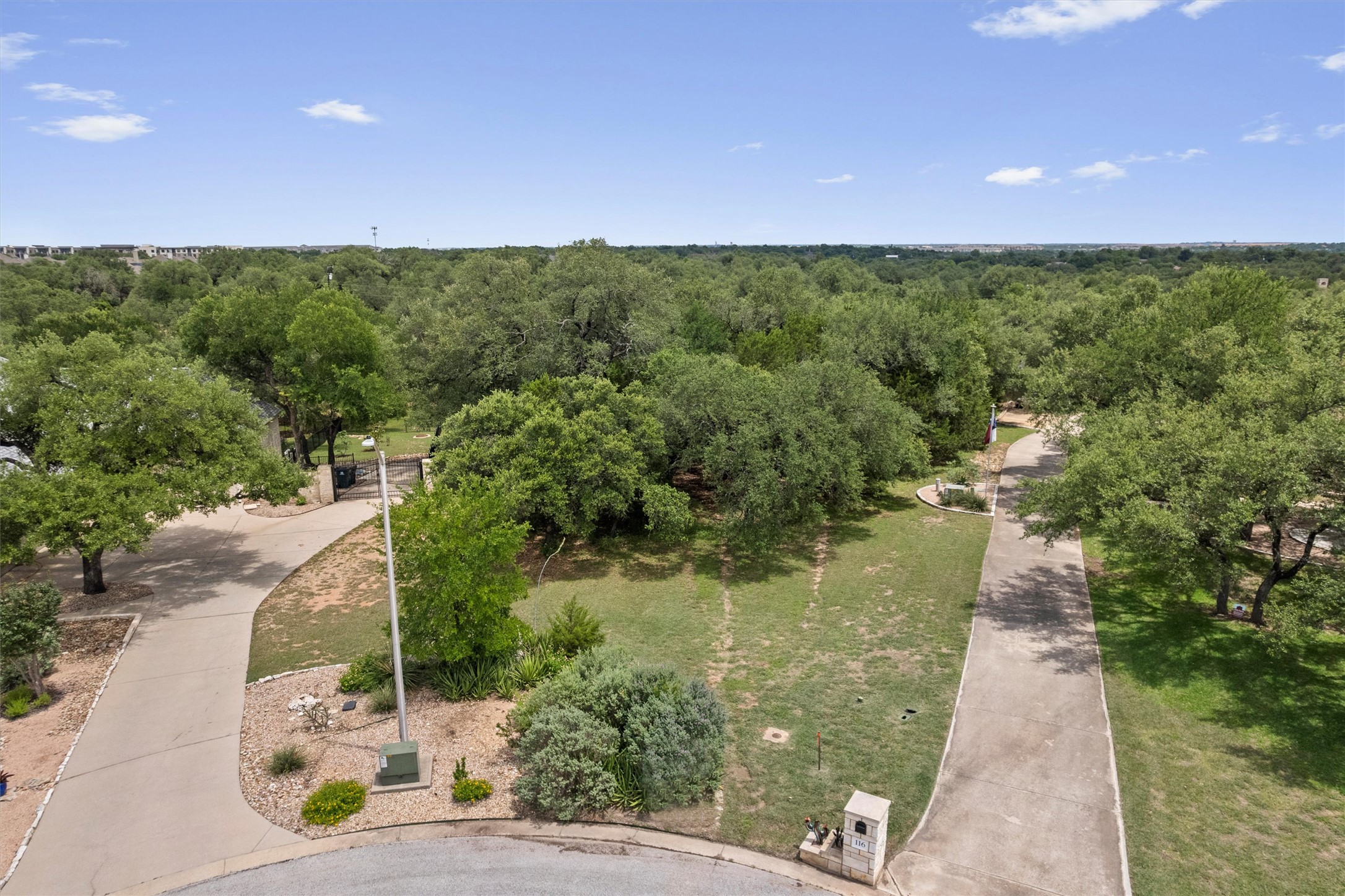 120 East Rustle Cove Georgetown, TX 78628 - Photo 16 of 25 a view of a street with a yard