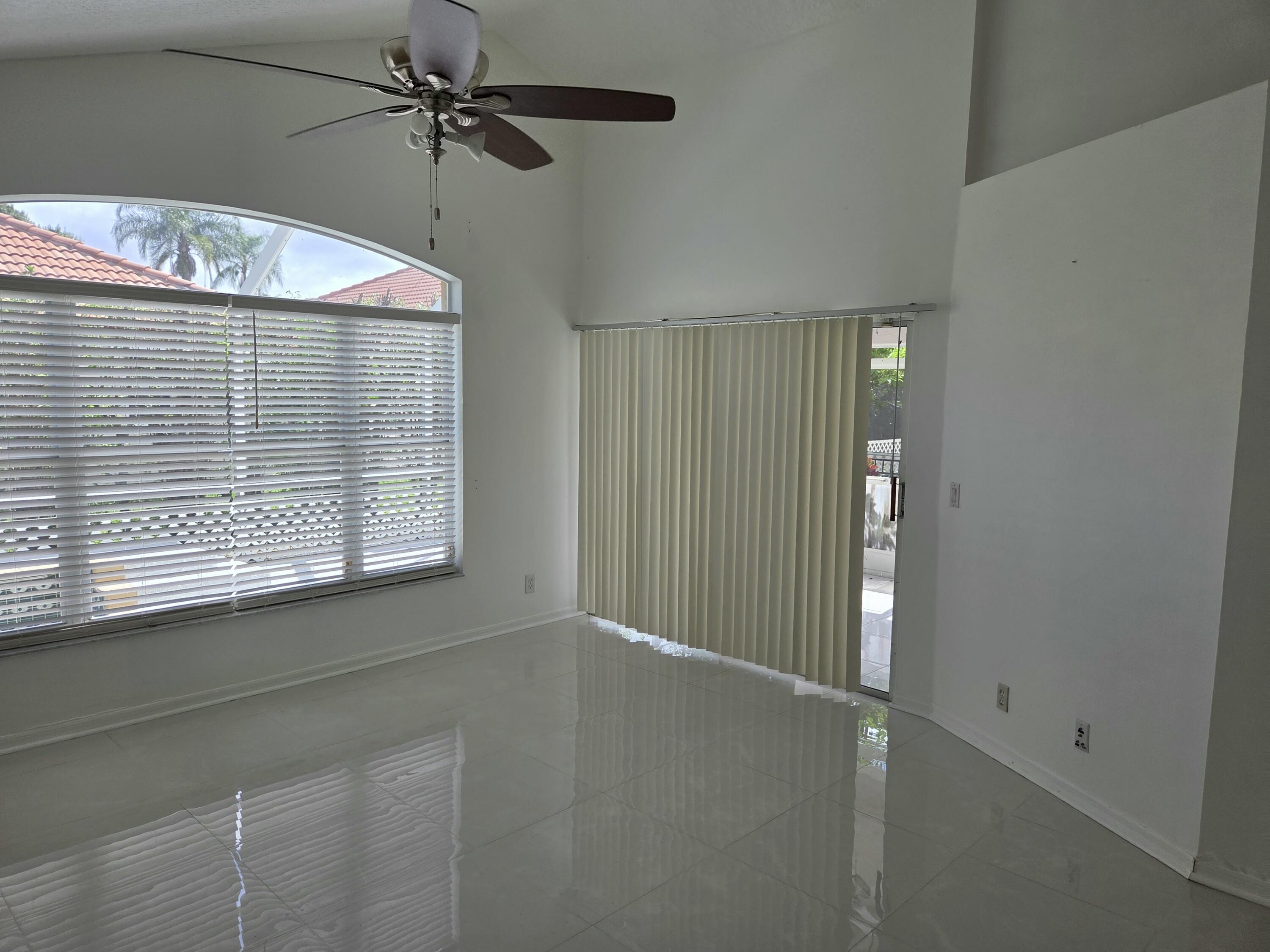 3021 Casa Rio Court Riviera Beach, FL 33418 - Photo 13 of 16 a view of a livingroom with a window