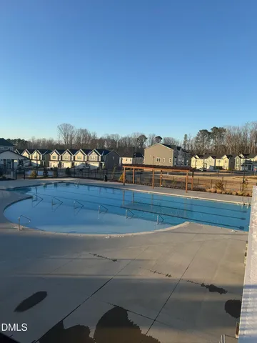 a view of a chairs and table on the wall