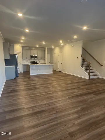 a view of kitchen and kitchen with stove