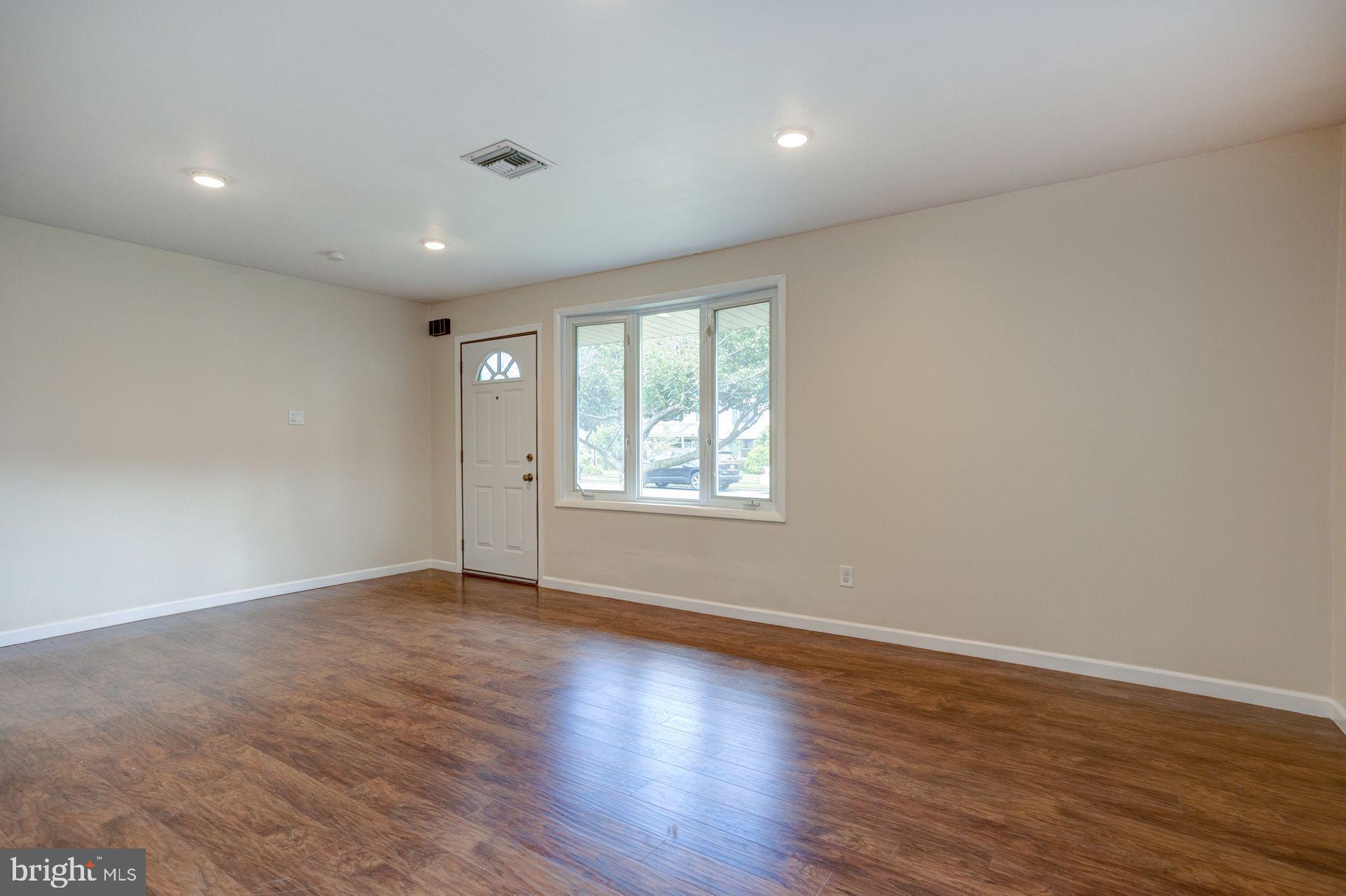 509 Filbert Road Oreland, PA 19075 - Photo 5 of 24 Living Room (front door)