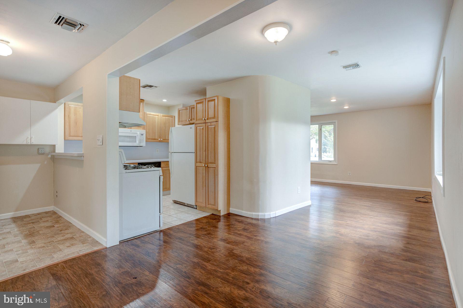 509 Filbert Road Oreland, PA 19075 - Photo 6 of 24 L to R - Laundry, Kitchen, Living Room