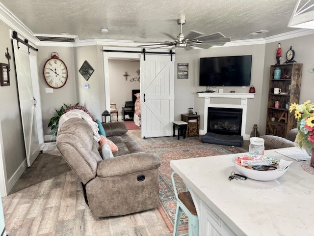 59 Private Road Dayton, TX 77535 - Photo 6 of 13 a living room with furniture a fireplace and a flat screen tv