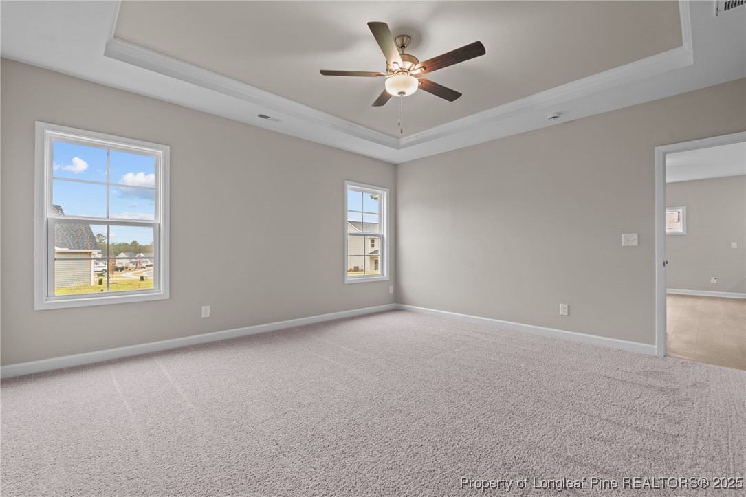 274 Rough Ridge Trail Aberdeen, NC 28315 - Photo 22 of 47 a view of an empty room with a window
