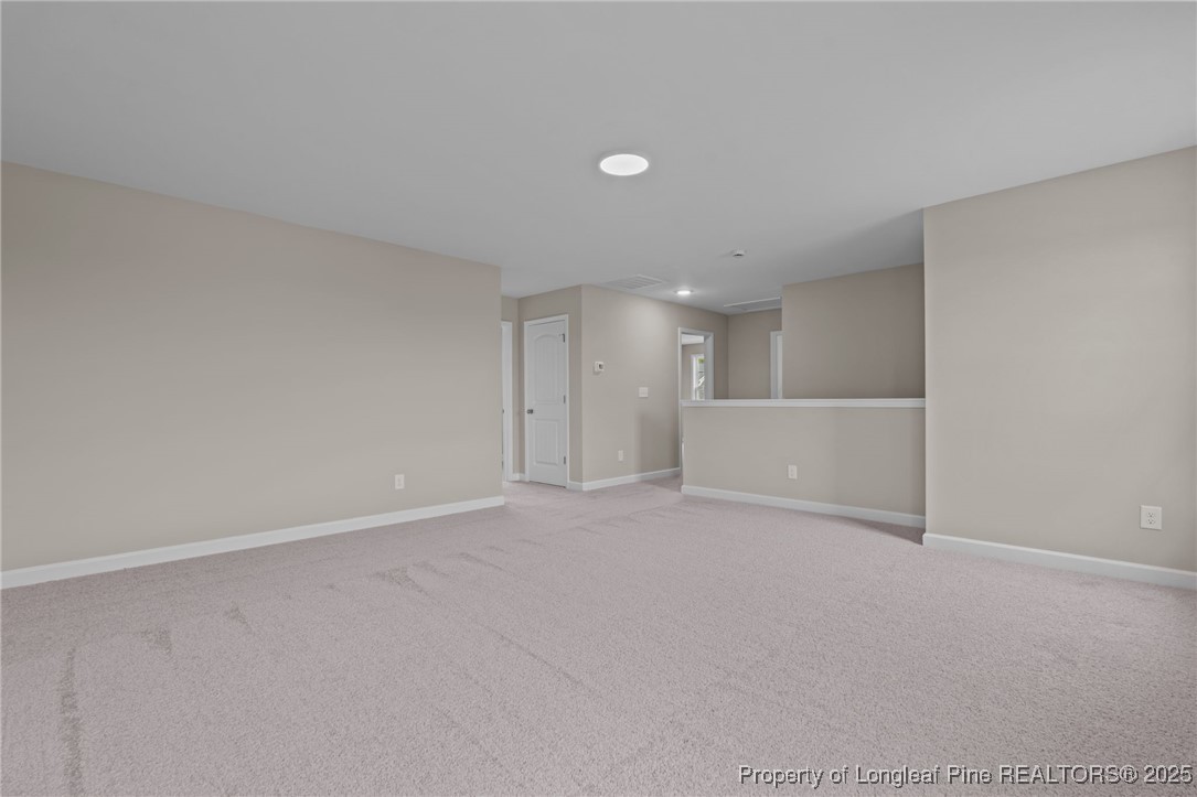 274 Rough Ridge Trail Aberdeen, NC 28315 - Photo 27 of 47 a view of an empty room