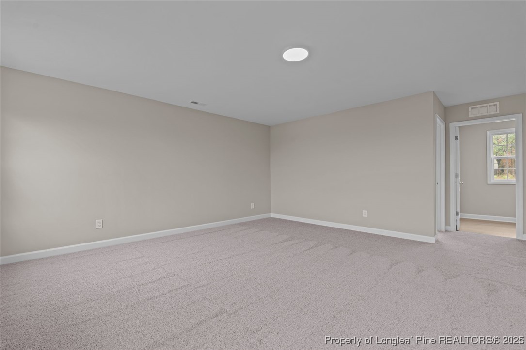 274 Rough Ridge Trail Aberdeen, NC 28315 - Photo 28 of 47 a view of an empty room