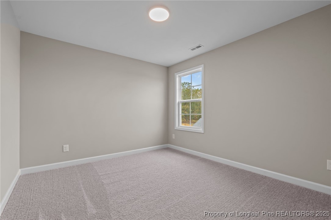 274 Rough Ridge Trail Aberdeen, NC 28315 - Photo 29 of 47 an empty room with a window