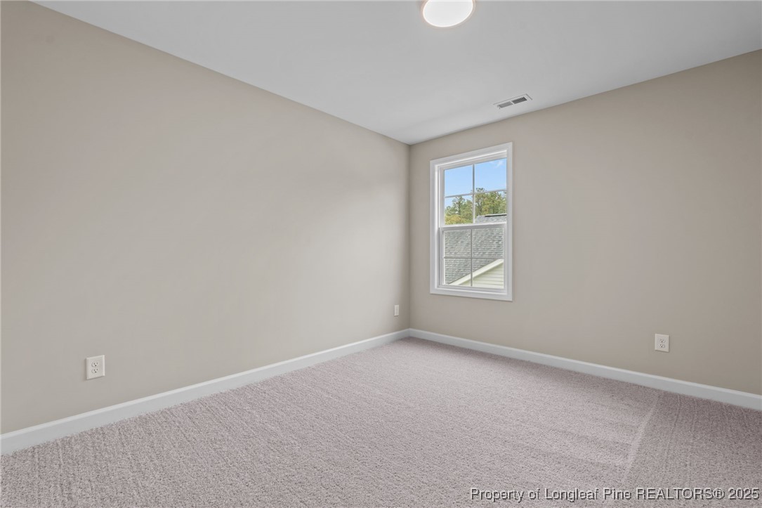 274 Rough Ridge Trail Aberdeen, NC 28315 - Photo 31 of 47 a big room with a window