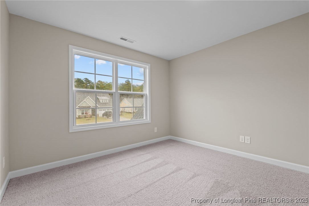 274 Rough Ridge Trail Aberdeen, NC 28315 - Photo 34 of 47 an empty room with a window