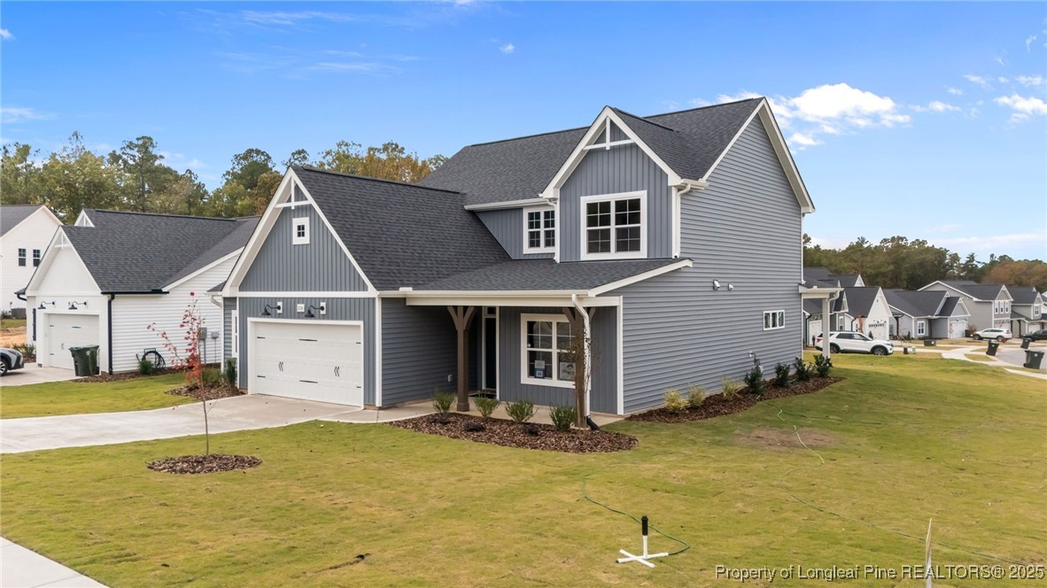 274 Rough Ridge Trail Aberdeen, NC 28315 - Photo 37 of 47 a view of a house with a yard