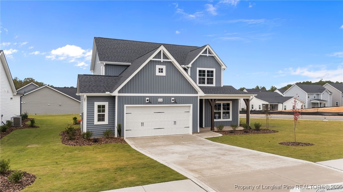 274 Rough Ridge Trail Aberdeen, NC 28315 - Photo 38 of 47 a front view of a house with a yard