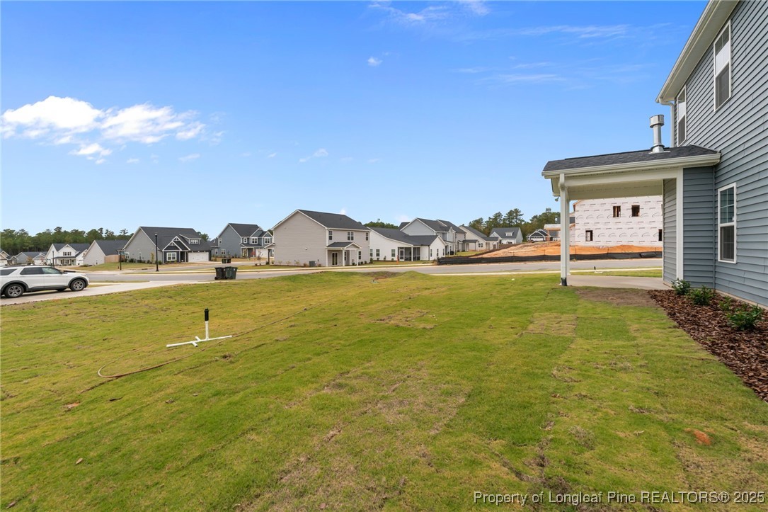 274 Rough Ridge Trail Aberdeen, NC 28315 - Photo 44 of 47 a front view of a house with a yard